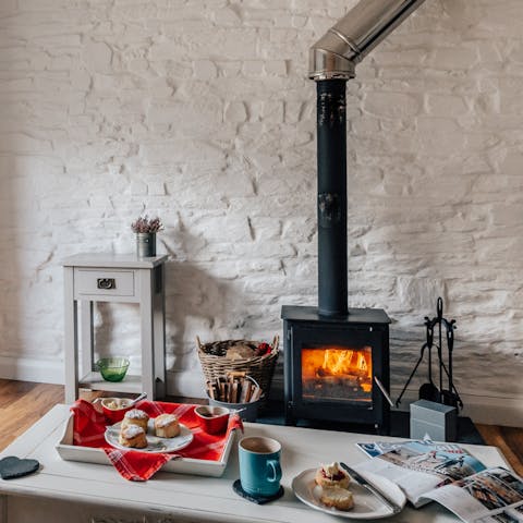 Treat yourself to a cream tea in front of the warming fireplace