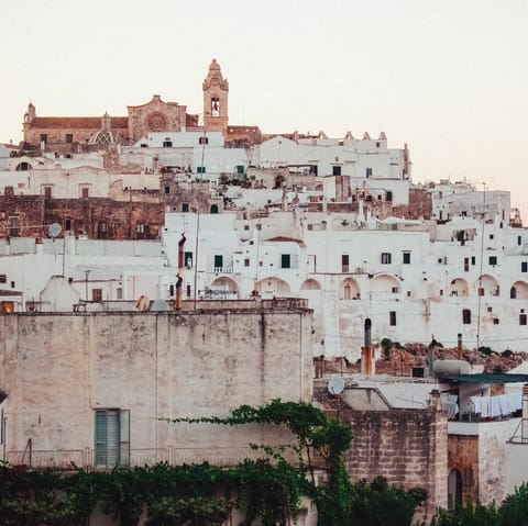 Explore the historic white-washed streets of Ostuni – a ten-minute drive