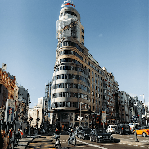 Walk over to the start of Gran Vía in fifteen minutes for tonnes of shopping and notable architecture