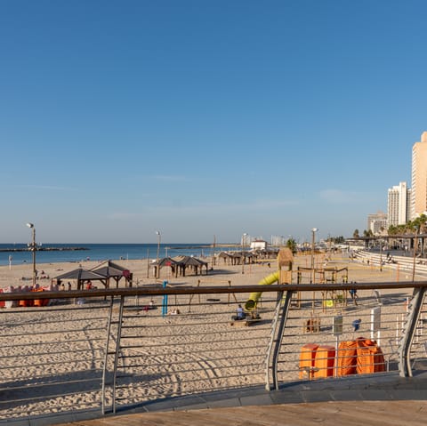 Spend the day unwinding on the beach – just a five-minute walk away