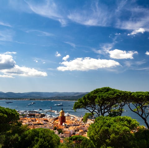 Drive up to the bustling town of Saint Tropez and its luxurious beaches