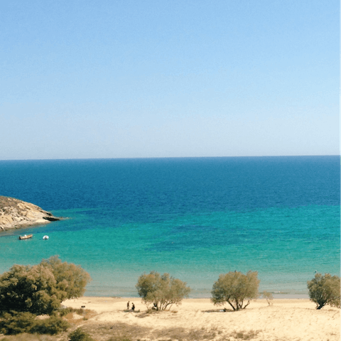 Head down to Sifneikos Beach – less than a kilometre away