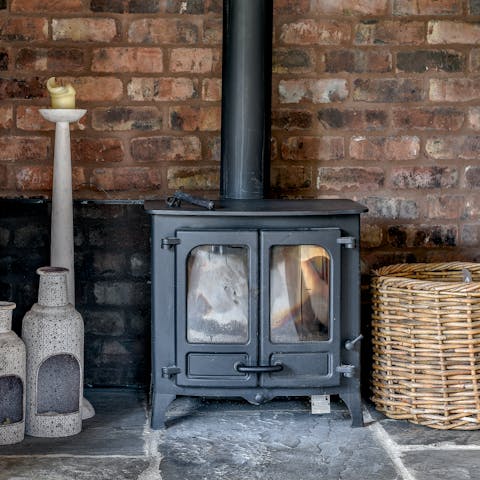 Put some kindling into the wood-burner and get toasty in front of a film