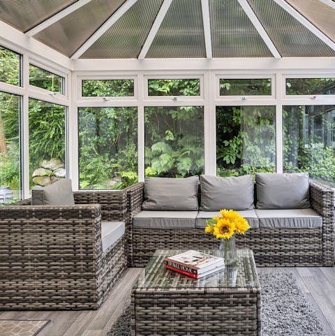 Relax in the conservatory with a good book and glass of wine