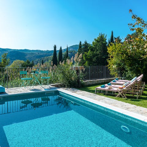 Plunge into the calm waters of the private pool and take in the stunning views