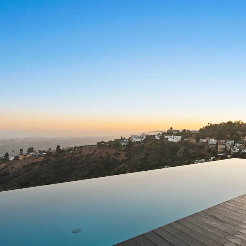 Slip into the infinity pool overlooking the city below