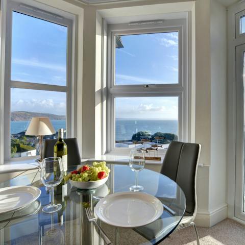 Sit down to dinner by the triple aspect windows while feasting on views of Looe Bay