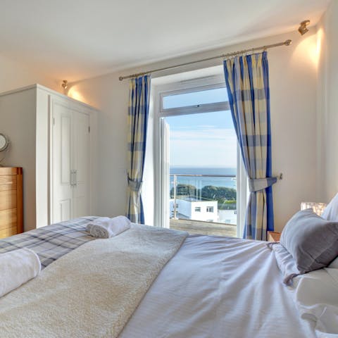 Wake up to beautiful sea views in the comfortable bedroom