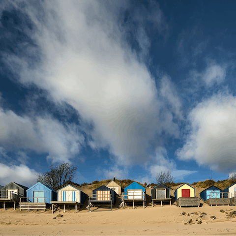 Take the short walk over to Abersoch beach and find picturesque beach huts
