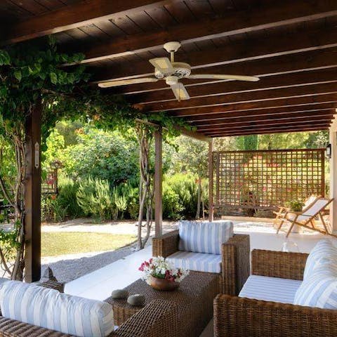 Open up a bottle of something cold and enjoy each sip hidden under the pergola
