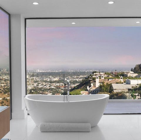 Soak in the spa-like bathtub while soaking up the views