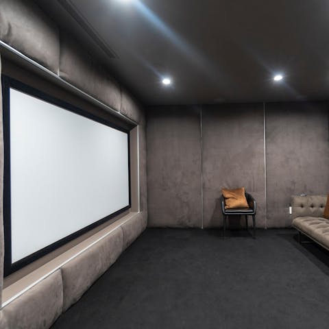 Watch a movie in the state-of-the-art home cinema