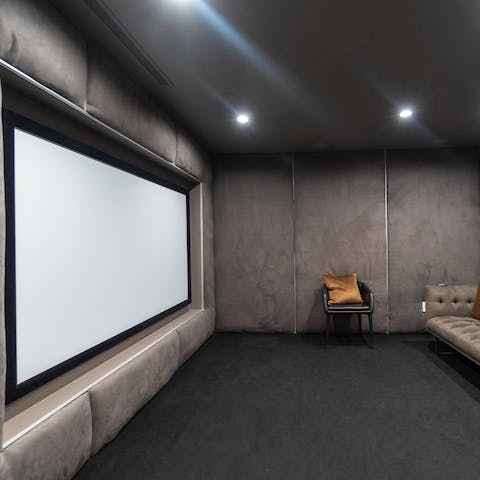 Watch a movie in the state-of-the-art home cinema