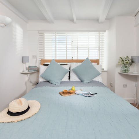 Wake up in the comfortable bedroom feeling rested and ready for another day of seaside fun
