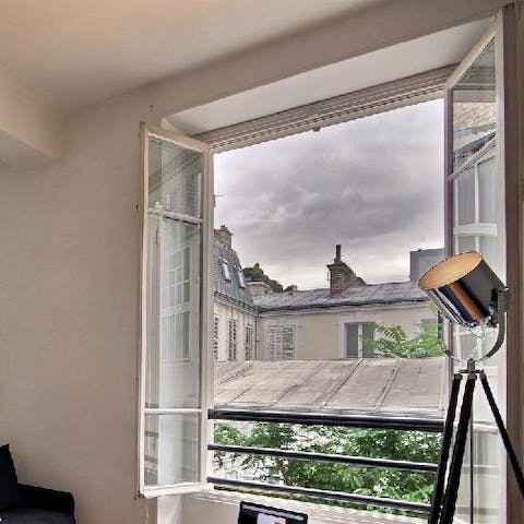 Check out views of neighbouring Parisian architecture and rooftops