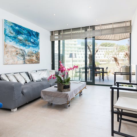 Unwind with a glass of sangria in the bright living room