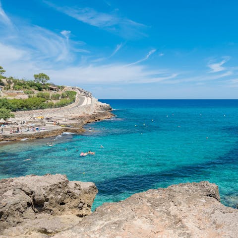 Dive into the Balearic Sea from Cala Molins, just 10m away