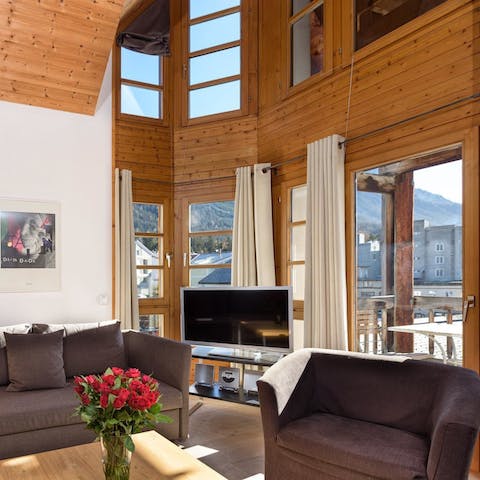 Gaze out at the mountain views from double-height living room