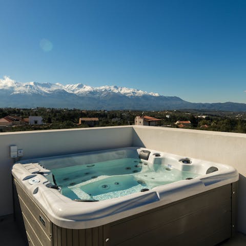 Gaze across the rugged landscape as your cares drift away in the hot tub