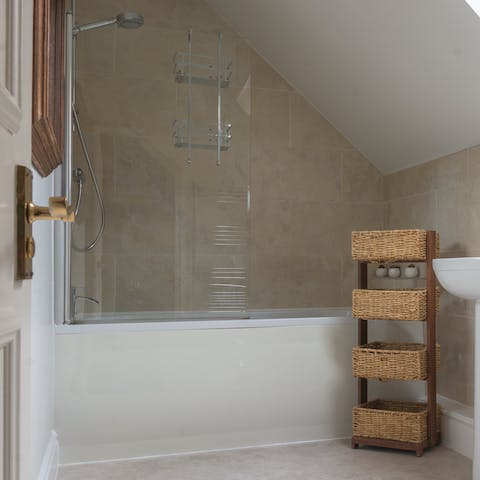 Treat yourself to a rejuvenating soak in the home's bathtub