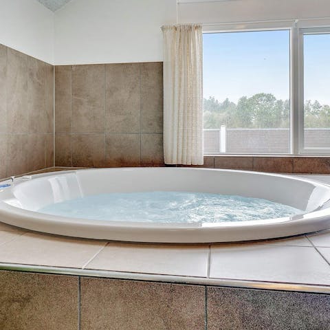 Have a relaxing soak in the indoor jacuzzi 