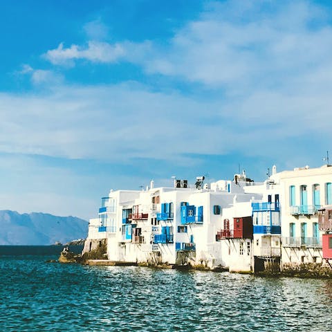 Discover the stunning coastline of Mykonos – the old port is only an eleven–minute drive away