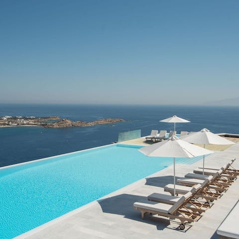 Enjoy heaven on earth whilst lounging by the swimming pool 