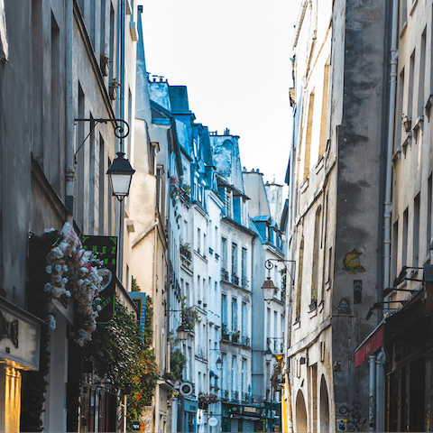 Explore the boutiques and cafes of Le Marais, just a short walk away
