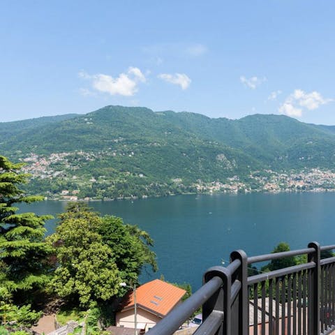 Admire panoramic views of the lake and hillside