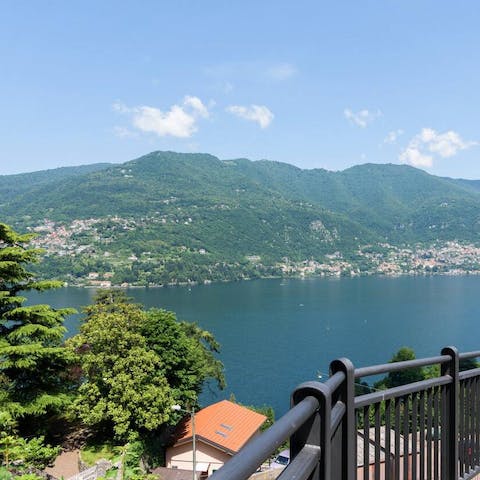 Admire panoramic views of the lake and hillside