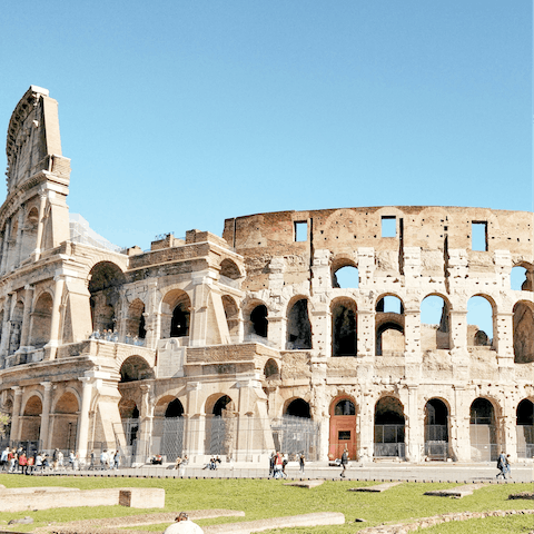Make the fifteen-minute walk to the Colosseum and Roman Forum