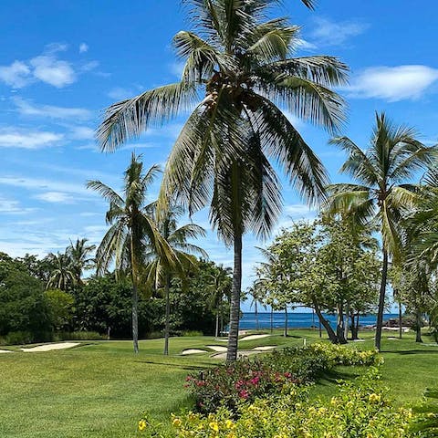 Ride your golf cart to the Jack Nicklaus-designed golf course