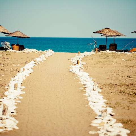 Visit the stunning Karsiyaka Beach, just 750 metres from the apartment