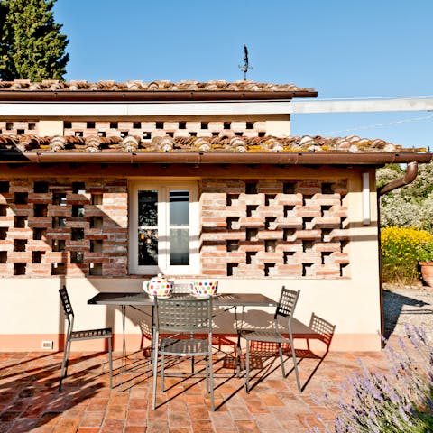 Tuck into an alfresco breakfast in the sunshine, on the rustic terracotta patio