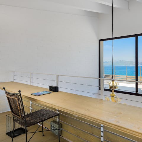 Make answering emails a breeze from the desk, which offers spectacular sea views