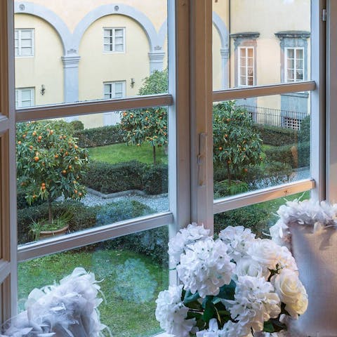 Wake up to views of the lush garden from the master bedroom