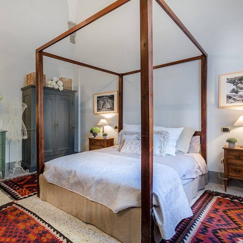 Enjoy a luxurious night's sleep in the four-poster bed ahead of a day of discovery