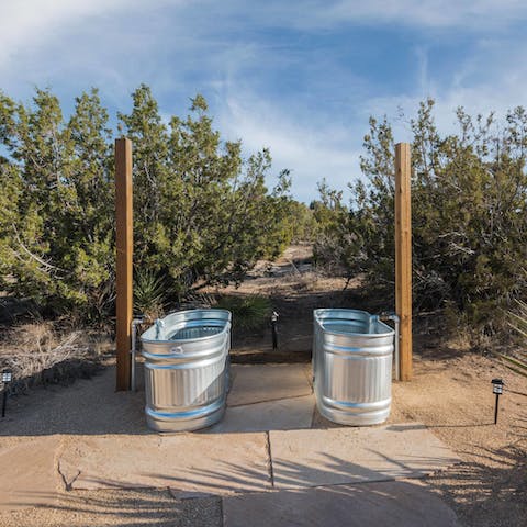 Wash off the desert dust in the outdoor cowboy tubs