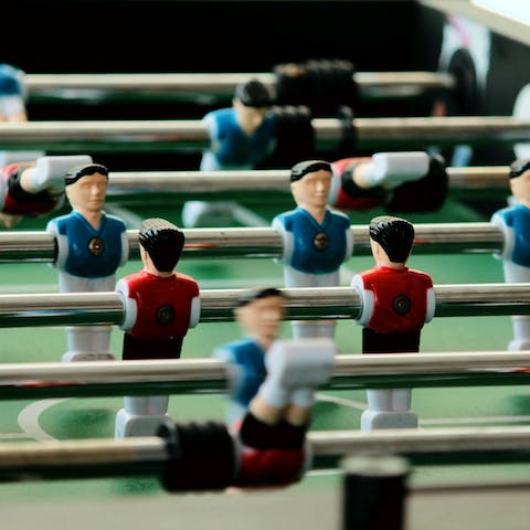 Get competitive over a game of table football in the living area 