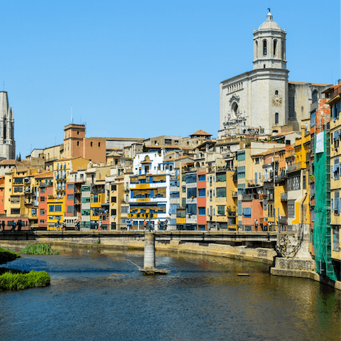Visit the colourful riverside city of Girona, just over half-an-hour's drive away