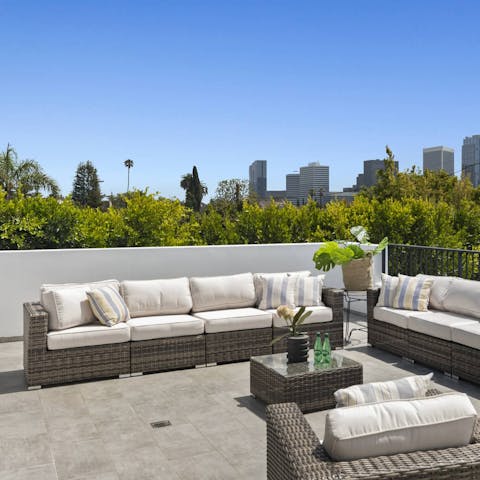 Gaze upon the LA skyline on your own stylishly outfitted rooftop terrace