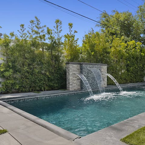 Relax underneath the California sun with a private jacuzzi and pool
