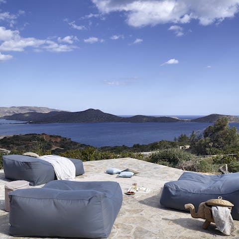 Sit back on the beanbags overlooking Mirabello Bay with drinks and snacks, and relax after a long day