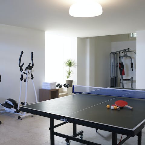 Keep up with your workout routine or play a game of table tennis in the gym, spa and games room
