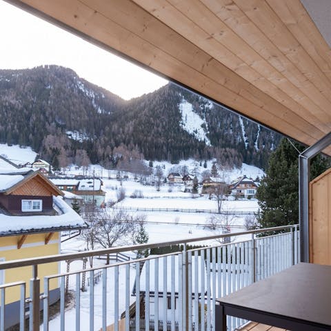 Take in dreamy alpine views from the balcony 