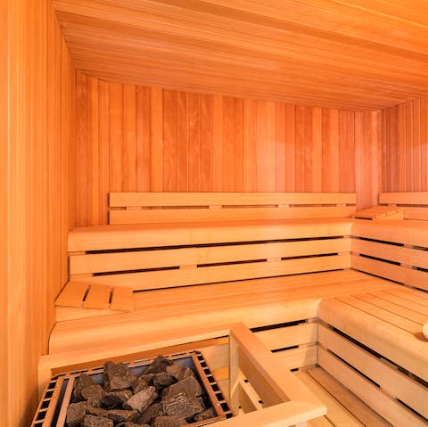 Feel the stress melt away in the private sauna