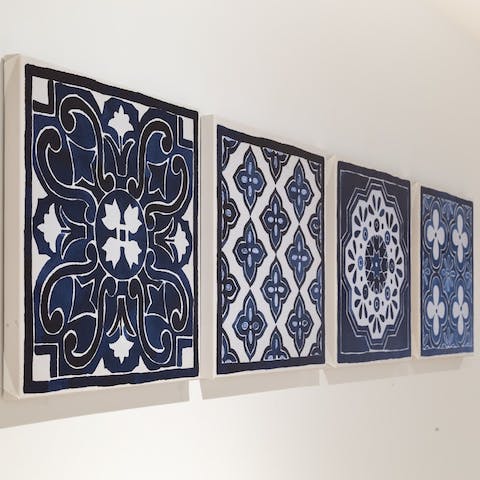 Admire the traditional tiled artwork in the hallway