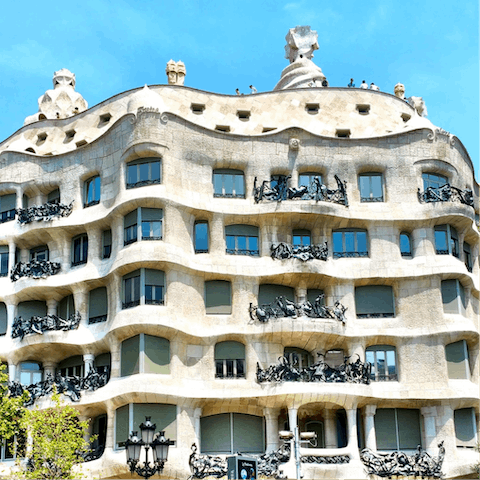 Head up to the decorative roof terrace of Casa Milà, less than twenty minutes by metro
