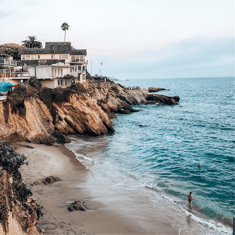 Explore Laguna Beach with its sandy stretches, hidden coves and seasonal festivals