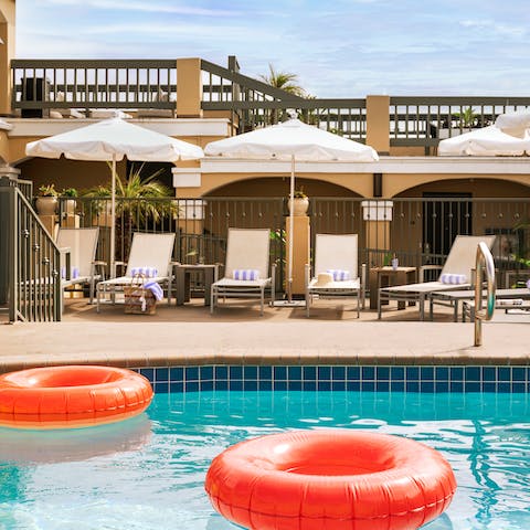 Splash around in the communal pool before working on your tan on the loungers